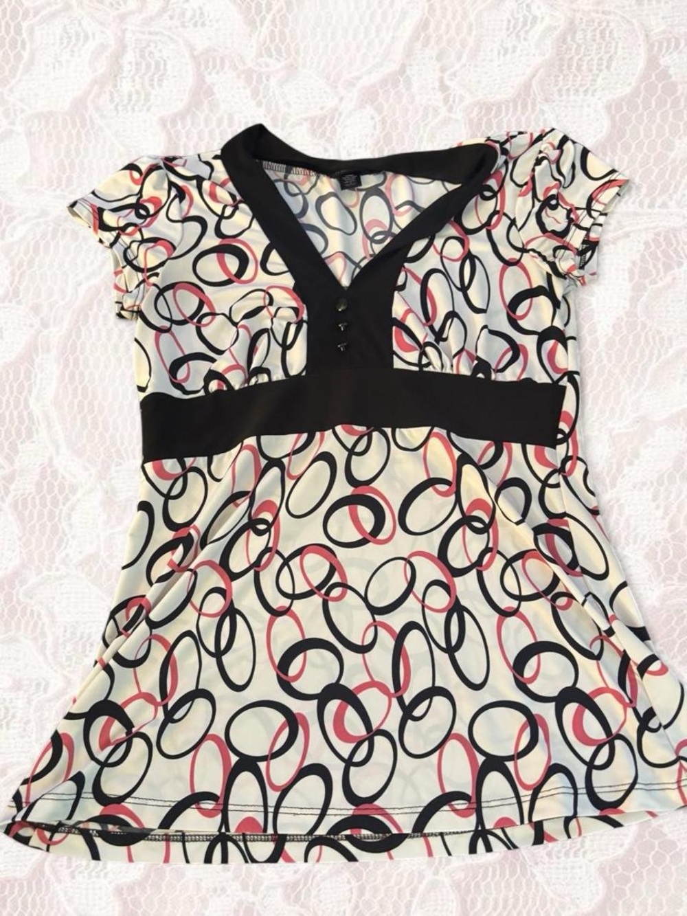 Womenโs Black-Trim Cream Top with Pink & Black Loop Print